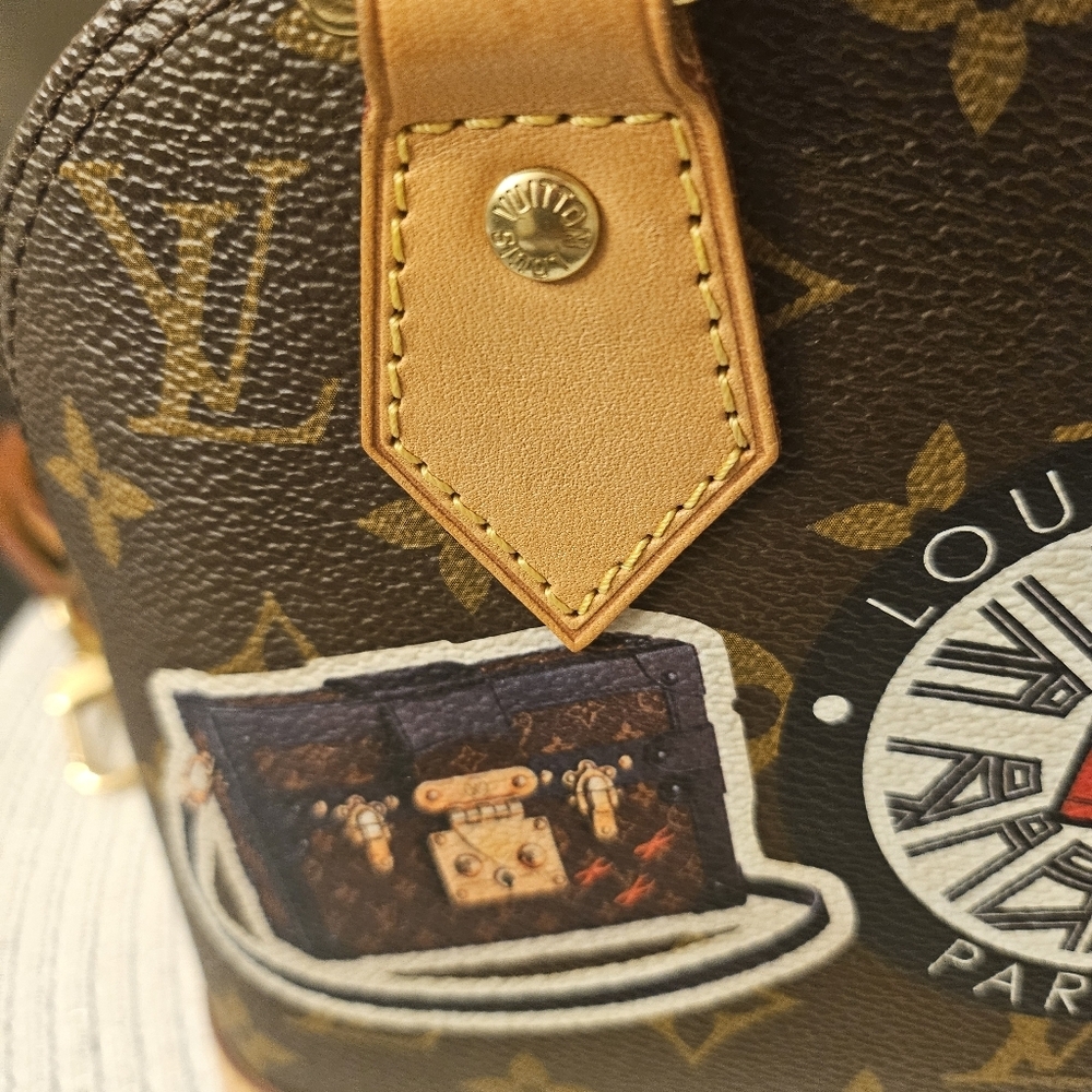Louis Vuitton Alma BB World Tour Monogram Crossbody Bag - Picture 9 of 14